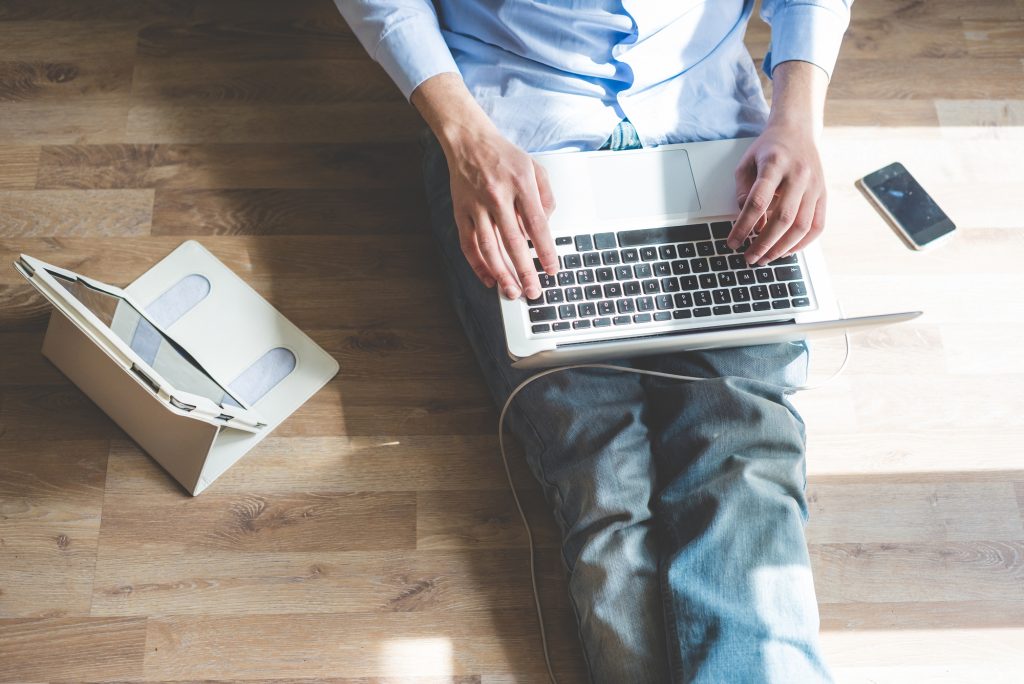 businessman working remotely on his laptop