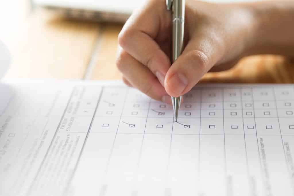 man doing a job survey by hand