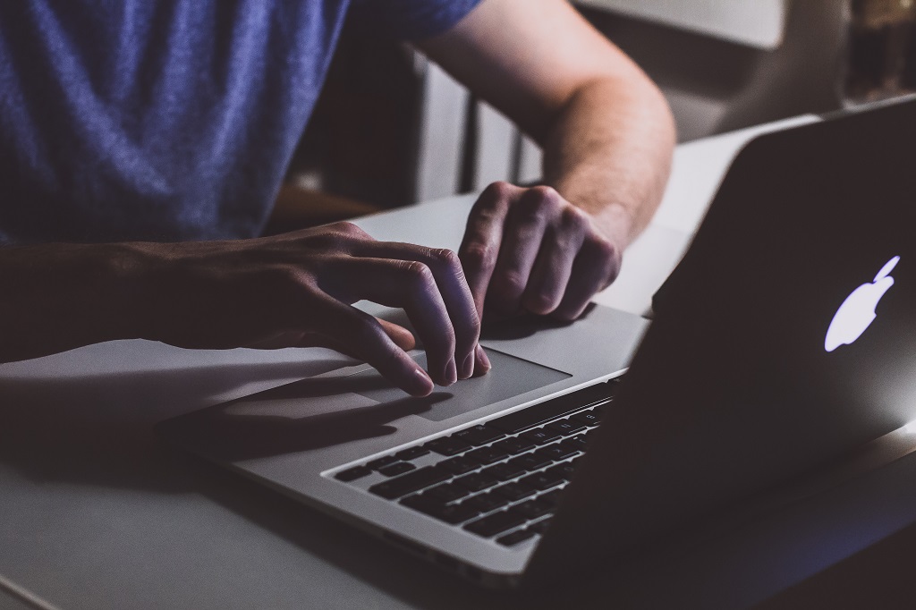 survey person collecting rebates on a laptop